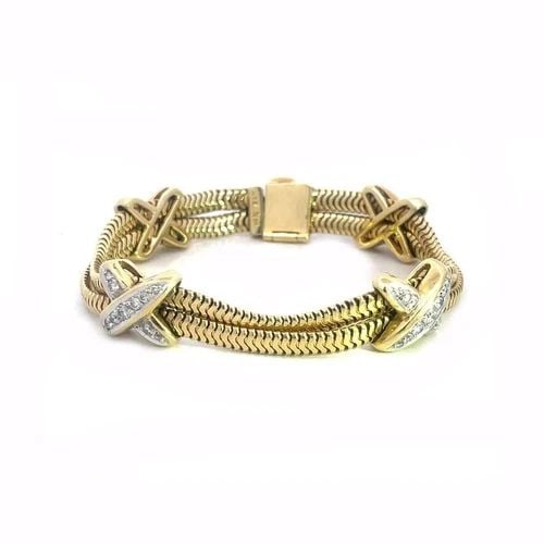 DIAMOND 14K GOLD BRACELET X MOTIFS TWO TONE DOUBLE SNAKE CHAIN: DIAMOND 14K GOLD BRACELET X MOTIFS TWO TONE DOUBLE SNAKE CHAIN This lovely casual everyday bracelet is crafted from 14k yellow gold with white gold accent featuring a double snake chain attached to a 