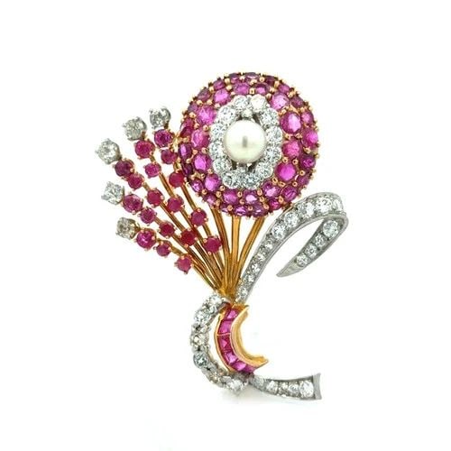DIAMOND RUBY GOLD BROOCH 14K YELLOW PLATINUM PEARL FLOWER BOUQUET STYLE: DIAMOND RUBY GOLD BROOCH 14K YELLOW PLATINUM PEARL FLOWER BOUQUET STYLE This lovely Diamond Ruby Gold Brooch is a vintage piece featuring a beautiful flower bouquet design. The main stone is natural w
