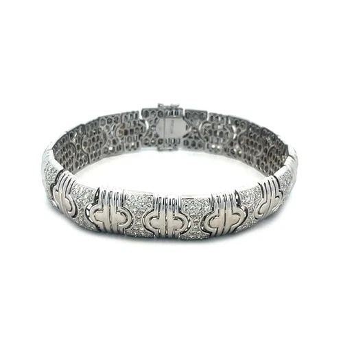DIAMOND GOLD BRACELET 18K WHITE PAVE SET FLEX LINK: Elegance meets versatility with this stunning diamond gold bracelet, crafted in 18k white gold and designed to dazzle. The bracelet features a flexible link design, adorned with a pavé-set array of n