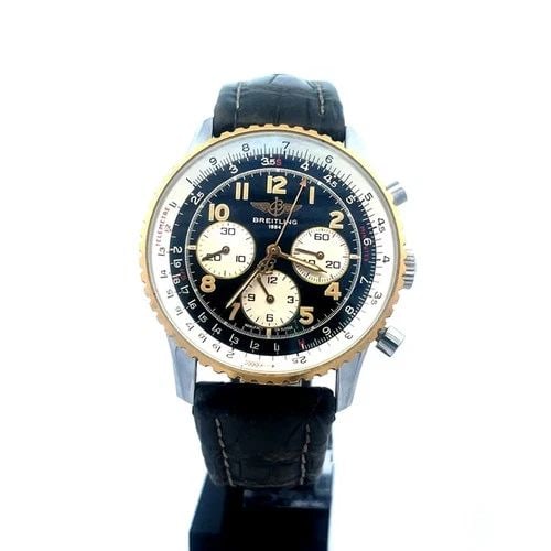 BREITLING NAVITIMER MEN'S WATCH D30022 AUTOMATIC STEEL LEATHER BAND: BREITLING NAVITIMER MEN'S WATCH D30022 AUTOMATIC STEEL LEATHER BAND The Breitling Navitimer Men's Watch D30022 is a luxurious timepiece featuring a stainless-steel case with a solid case-back and a ye