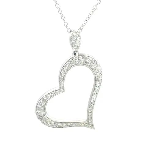 PIAGET DIAMOND GOLD HEART NECKLACE 18K WHITE PAVE SET W/CHAIN: PIAGET DIAMOND GOLD HEART NECKLACE 18K WHITE PAVE SET W/CHAIN This charming authentic pendant and chain is by Piaget, they are crafted from 18k white gold with a polished finish. The pendant features 