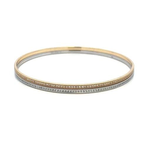 DIAMOND 3CT GOLD BANGLES SET OF 2 PAVE SET 18K MILGRAIN VERA WANG DESIGN: DIAMOND 3CT GOLD BANGLES SET OF 2 PAVE SET 18K MILGRAIN VERA WANG DESIGN This elegant set of 2 gold bangles are by designer Vera Wang; they feature a stunning pave set of natural white pave set diamon