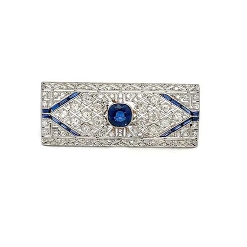 ART DECO DIAMOND BROOCH PLATINUM 18K GOLD SAPPHIRE RECTANGLE SHAPE: ART DECO DIAMOND BROOCH PLATINUM 18K GOLD SAPPHIRE RECTANGLE SHAPE This Art Deco brooch is crafted from platinum top with 18k white gold back and pin. it features a rectangle shape frame small rose cu