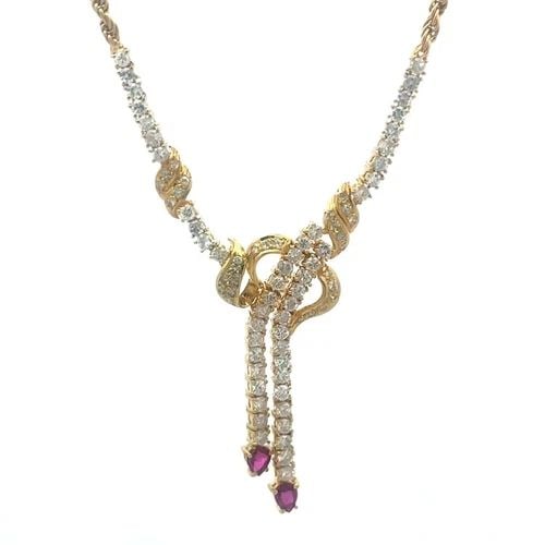 DIAMOND RUBY GOLD NECKLACE 18K YELLOW LARIAT DANGLE STYLE: DIAMOND RUBY GOLD NECKLACE 18K YELLOW LARIAT DANGLE STYLE Elevate your jewelry collection with this gold necklace, it is a stunning piece of fine jewelry made with 18k yellow gold. The lariat style an