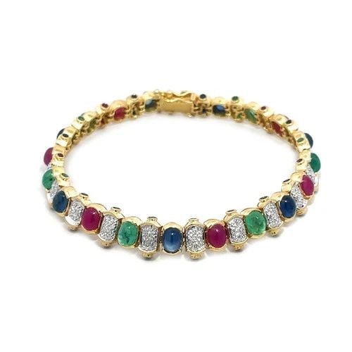 EMERALD RUBY SAPPHIRE GOLD BRACELET DIAMOND PAVE SET OVAL LINK STYLE 18K: EMERALD RUBY SAPPHIRE GOLD BRACELET DIAMOND PAVE SET OVAL LINK STYLE 18K This 18k yellow gold bracelet is a stunning combination of natural gemstones and pave set sparkling diamonds. The bracelet show