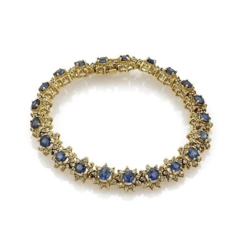 ESTATE BRACELET 12 CARATS SAPPHIRE & DIAMOND 18K YELLOW GOLD STAR LINK BRACELET: ESTATE BRACELET 12 CARATS SAPPHIRE & DIAMOND 18K YELLOW GOLD STAR LINK BRACELET Estate 12 Carats Sapphire & Diamond 18k YGold Star Link Bracelet Description This is a beautiful Estate bracelet, it is 
