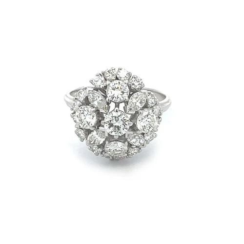 DIAMOND 18K MARQUEES WHITE GOLD DOME FLORAL TOP 2.5CT: DIAMOND 18K MARQUEES WHITE GOLD DOME FLORAL TOP 2.5CT This is a fabulous ring; the high gallery bridge and shank is crafted from 18k white gold with a polished finish. The top has an assortment of pro