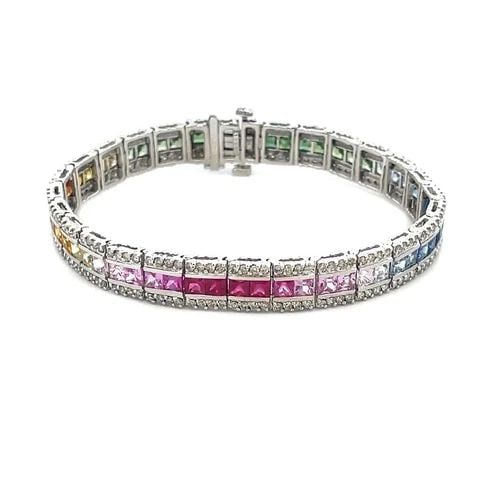 RAINBOW SAPPHIRE GOLD BRACELET DIAMOND 13K WHITE GOLD MULTI-COLOR: RAINBOW SAPPHIRE GOLD BRACELET DIAMOND 13K WHITE GOLD MULTI-COLOR This is a gorgeous tennis bracelet, it is crafted from 13k white gold with a polished finish featuring flexible square links joined to