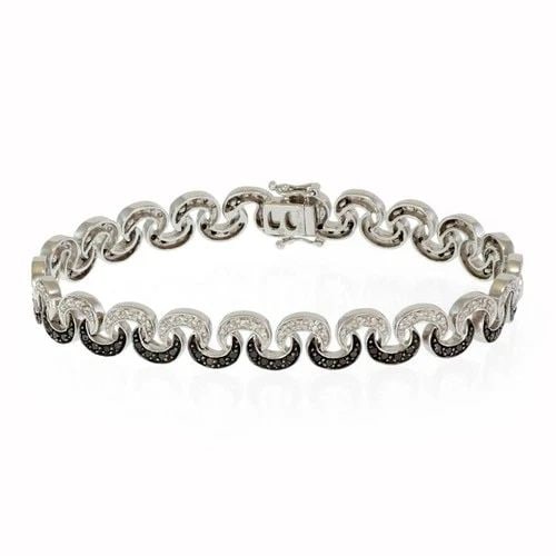 DIAMOND BRACELET 14K WHITE GOLD BLACK & WHITE DIAMONDS: DIAMOND BRACELET 14K WHITE GOLD BLACK & WHITE DIAMONDS This 14k white gold diamond bracelet features a fancy link style with black and white diamonds set in the design. The bracelet has a slide closur