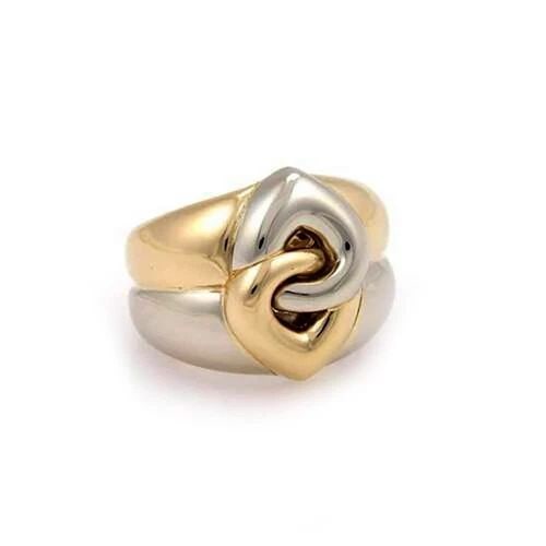 BVLGARI RING 18K TWO TONE GOLD INTERLOCKING HEART STACK BAND SIZE 4.75: BVLGARI RING 18K TWO TONE GOLD INTERLOCKING HEART STACK BAND SIZE 4.75 This bold impressive authentic ring is by Bvlgari, it is crafted from 18k yellow and white gold with a polished finish featuring 
