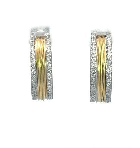 PASQUALE BRUNI GOLD EARRINGS DIAMOND 18K TWO TONE HOOP STYLE: This lovely pair of authentic hoop earrings are by Pasquale Bruni, crafted from 18k white gold with yellow gold accent. The pair features 6mm wide hoops with fine line textured yellow gold around the 