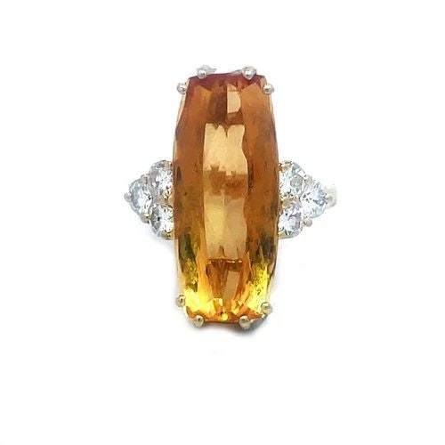 DIAMOND IMPERIAL TOPAZ GOLD RING 11.90CT LONG TOP 14K YELLOW COCKTAIL STYLE: DIAMOND IMPERIAL TOPAZ GOLD RING 11.90CT LONG TOP 14K YELLOW COCKTAIL STYLE This is a stunning Imperial Topaz and diamond gold ring, it features a long shaped yellow Imperial Topaz as the main stone a