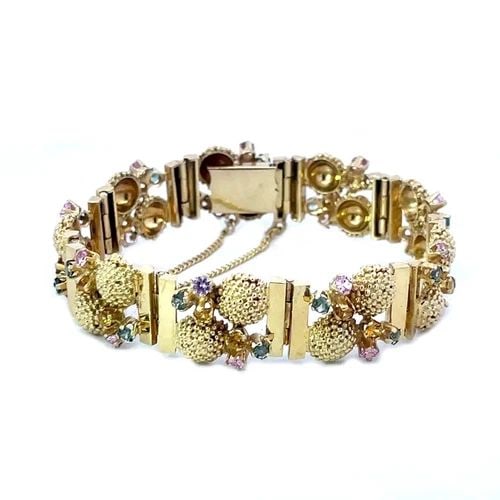 VINTAGE 1960'S GOLD BRACELET 14K YELLOW GEMSTONES SEA LIFE CORAL DESIGN: VINTAGE 1960'S GOLD BRACELET 14K YELLOW GEMSTONES SEA LIFE CORAL DESIGN This marine life vintage bracelet is crafted from 14k yellow gold featuring section links joined together by fine hinged pin. Ea