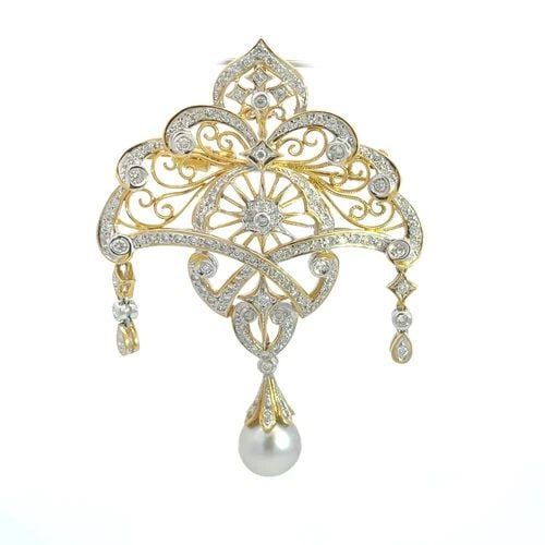 ESTATE 1CT DIAMOND PEARL 18K TWO TONE GOLD FANCY BROOCH PENDANT LIQUIDATION: ESTATE 1CT DIAMOND PEARL 18K TWO TONE GOLD FANCY BROOCH PENDANT This is a gorgeous Estate brooch or pendant, crafted from 18k yellow and white gold featuring a fancy large open scroll design with a su