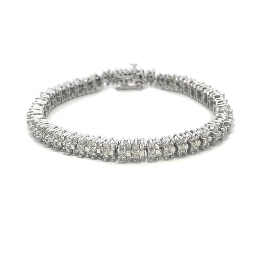 DIAMOND GOLD TENNIS BRACELET 14K WHITE CLUSTER BAGUETTE AND ROUND: DIAMOND GOLD TENNIS BRACELET 14K WHITE CLUSTER BAGUETTE AND ROUND 4. This is a stunning diamond tennis bracelet, it is crafted from 14k white gold with a polished finish featuring flex small link fram