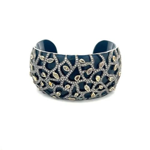 DIAMOND GOLD ONYX 2.5CT YELLOW & SILVER LEAF VINE BEZEL WIDE CUFF BRACELET: DIAMOND GOLD ONYX 2.5CT YELLOW & SILVER LEAF VINE BEZEL WIDE CUFF BRACELET This is a chic wide dome shape black onyx cuff bracelet. The inside of the band is in a smooth polished finish which allows f