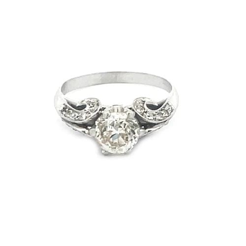 ART DECO PLATINUM RING EUROPEN CUT 1CT DIAMOND SCROLL SHANK: ART DECO PLATINUM RING EUROPEN CUT 1CT DIAMOND SCROLL SHANK This Art Deco platinum ring features a stunning European cut diamond set in a beautifully crafted scroll shank with small rose cut diamonds.