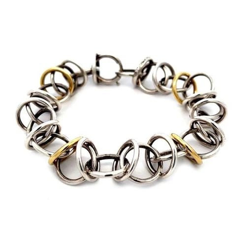 TIFFANY & CO. PICASSO BRACELET WOVEN RINGS STERLING SILVER 18K YELLOW GOLD: TIFFANY & CO. PICASSO BRACELET WOVEN RINGS STERLING SILVER 18K YELLOW GOLD This is a vintage authentic bracelet from Tiffany & Co. by Paloma Picasso, it is crafted from sterling silver with four 18k y