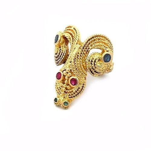 RUBY SNAKE RING SAPPHIRE EMERALD 18K YELLOW GOLD CABLE GREEK STYLE: RUBY SNAKE RING SAPPHIRE EMERALD 18K YELLOW GOLD CABLE GREEK STYLE This is an 18k yellow gold ring featuring a multi-row fine twisted rope fashioned into a snake's head with ruby eyes and emerald nose