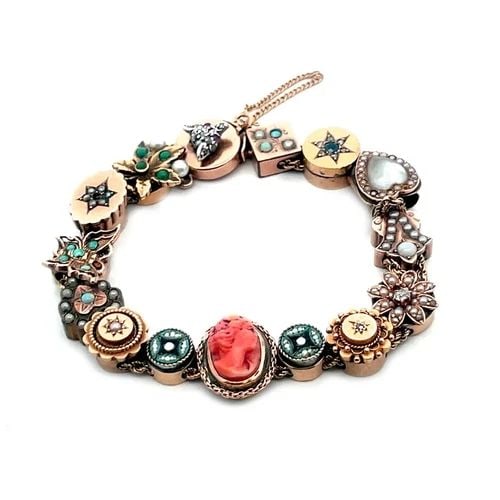 VICTORIAN SLIDE CHARMS GOLD BRACELET 15 ASSORTED SIZE & SHAPE DIAMOND & GEM: VICTORIAN SLIDE CHARMS GOLD BRACELET 15 ASSORTED SIZE & SHAPE DIAMOND & GEM This is a Victorian slide charms bracelet, it is crafted in yellow gold featuring 15 assorted size and shape slide accented 