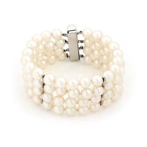 14K WHITE GOLD - 4 STRAND PEARLS WIDE BRACELET: 14K WHITE GOLD - 4 STRAND PEARLS WIDE BRACELET 4 Strand Pearls 14k White Gold Wide Bracelet Description This lovely vintage bracelet is crafted from 14k white gold featuring 4 strands of lustrous pear