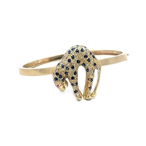 DIAMOND GOLD PANTHER BRACELET 14K YELLOW GEMSTONE HINGED BANGLE: DIAMOND GOLD PANTHER BRACELET 14K YELLOW GEMSTONE HINGED BANGLE The Diamond Gold Panther Bracelet is a luxurious piece of fine jewelry crafted with 14k yellow gold and featuring natures white diamond 