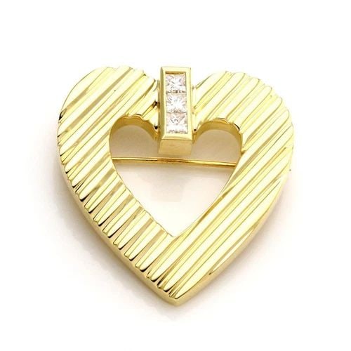 TIFFANY & CO. DIAMOND 18K YELLOW GOLD FLUTED HEART BROOCH LIQUIDATION!!: TIFFANY & CO. DIAMOND 18K YELLOW GOLD FLUTED HEART BROOCH !! Tiffany & Co. Diamond 18k Yellow Gold Fluted Heart Brooch !! Description This lovely authentic brooch is from Tiffany & Co. It is crafted f