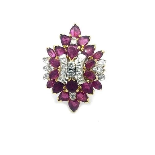 DIAMOND RUBY GOLD RING 18K YELLOW CLUSTER LONG TOP DOME STYLE: DIAMOND RUBY GOLD RING 18K YELLOW CLUSTER LONG TOP DOME STYLE The Diamond Ruby Gold Ring is a stunning piece of fine jewelry featuring a natural white diamond set between a cluster of pear and marquis