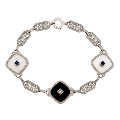 ART DECO DIAMOND SAPPHIRE ONYX CAMPHOR GLASS 14K GOLD FILIGREE BRACELET: ART DECO DIAMOND SAPPHIRE ONYX CAMPHOR GLASS 14K GOLD FILIGREE BRACELET Art Deco Diamond Sapphire Onyx Camphor Glass 14k Gold Filigree Bracelet Description This is an Art Deco bracelet, crafted from 1