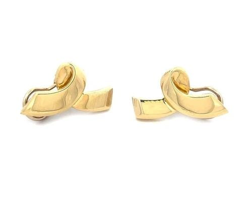 TIFFANY & CO. PICASSO RIBBON GOLD EARRINGS VINTAGE 18K YELLOW CLIP ON: TIFFANY & CO. PICASSO RIBBON GOLD EARRINGS VINTAGE 18K YELLOW CLIP ON This is a lovely vintage pair of earrings from Tiffany & Co. by designer Paloma Picasso. They are crafted from 18k yellow gold wit