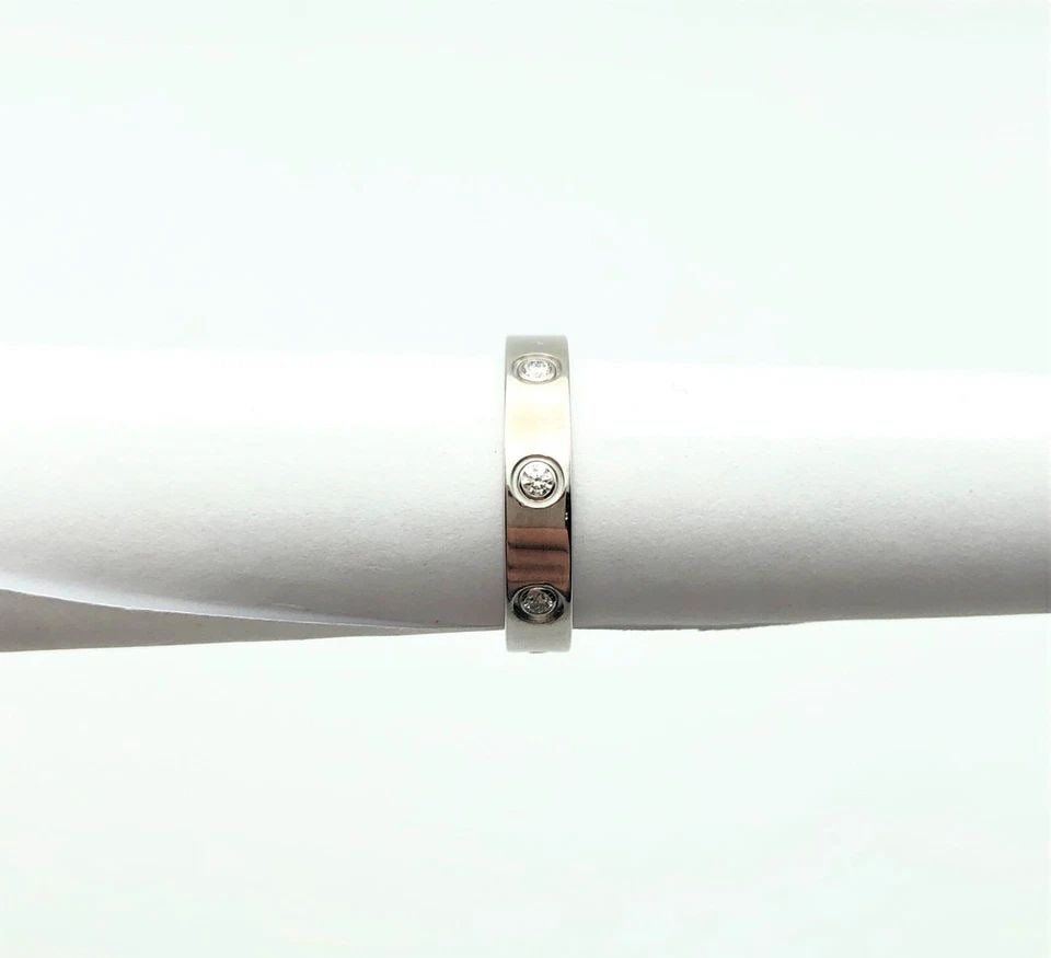 AUTHENTIC CARTIER 18K WHITE GOLD RING 4MM WITH 8 DIAMONDS (SIZE 6) 4.5 GRAM: AUTHENTIC CARTIER 18K WHITE GOLD RING 4MM WITH 8 DIAMONDS (SIZE: 6) Cartier 18k White Gold Ring with 8 Diamonds You are bidding on a Cartier 18k White Gold Ring with 8 Diamonds. The piece has been ful