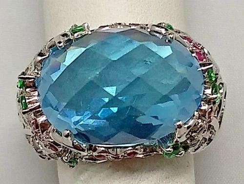 14K WHITE GOLD BLUE TOPAZ RING, DIAMONDS, RUBIES, EMERALDS ( SIZE: 6.5 ) 13.4G: 14K WHITE GOLD BLUE TOPAZ RING WITH DIAMONDS, RUBIES AND EMERALDS 14k White Gold Blue Topaz Ring with Diamonds Rubies and Emeralds You are bidding on a 14k white gold ring with genuine topaz, rubies, 