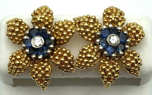 18K GOLD FLOWER EARRINGS, 14K STEMS/BACKS, SAPPHIRES, 0.20CTS OF DIAMONDS 9.1G: 18K GOLD FLOWER EARRINGS, 14K STEMS/BACKS, NAT SAPPHIRES AND 0.20CTS OF DIAMONDS 18k Gold Flower Earrings, 14k stem/backs, Natural Sapphires and 0.20cts of Diamonds Condition: Used Material: Leaves ar