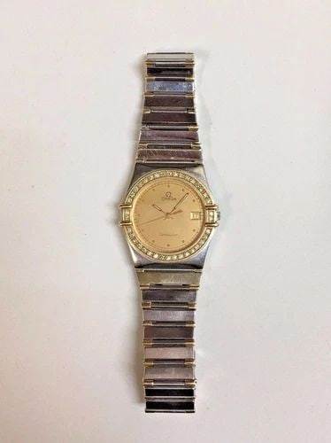 WOMEN'S OMEGA CONSTELLATION 1448 DIAMOND BEZEL, S. STEEL AND 18K GOLD 34MM: WOMEN'S OMEGA CONSTELLATION 1448 DIAMOND BEZEL WITH 18K GOLD/SS Women's Omega 1448 Diamond Bezel with 18k gold/ss You are bidding on a pre-owned Women's Omega 1448 watch. The watch is in excellent wor
