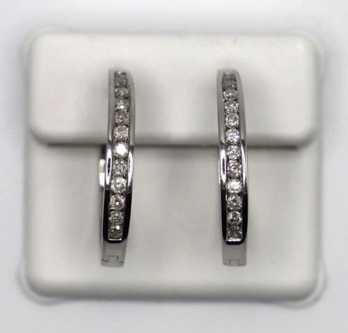 14K WHITE GOLD HOOP STYLE EARRINGS WITH 1.00CTW NATURAL DIAMONDS 9.3 GRAMS: 14K WHITE GOLD HOOP STYLE EARRINGS WITH 1.00CTW OF DIAMONDS 14k White Gold Hoop style Earrings with 1.00ctw of Diamonds You are bidding on a 14k White Gold Hoop style Earrings with 1.00ctw of Diamonds