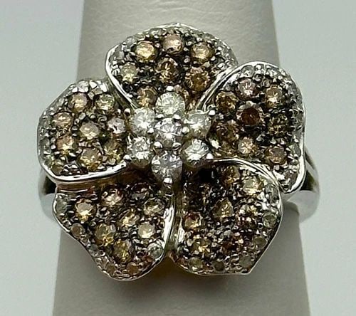 14K WHITE GOLD FLOWER RING, 1.33CTS WHITE & BROWN DIAMONDS ( SIZE: 8.25 ) 6.6G: 14k White Gold Flower Ring set with 1.33cts white & brown Diamonds Condition: Used Material: 14k White Gold Ring Size: 8.25 Weight: 6.6 grams Top Width: 20mm Bottom Width: 1.5mm Stone Info: Round bril