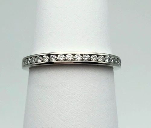 TIFFANY & CO. PLATINUM BAND WITH 0.17CT DIAMONDS (SIZE:6.5): TIFFANY & CO. PLATINUM BAND WITH 0.17CT DIAMONDS (SIZE:6.5) Tiffany & Co. Platinum Band with 0.17ct Diamonds You are bidding on a Tiffany & Co. Platinum Band with 0.17ct Diamonds. The ring has been fu