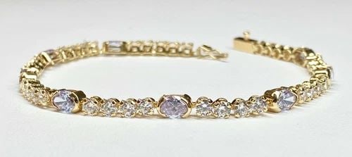 14K GOLD BRACELET, WHITE & LAVENDER CUBIC ZIRCONIA STONES (7.25 INCH) 8.8 GRAMS: WOMEN'S 14K YELLOW GOLD BRACELET WITH WHITE AND LAVENDER CUBIC ZIRCONIA STONES Women's 14k Yellow Gold Bracelet with White and Lavender Cubic Zirconia Stones You are bidding on a pre-owned Women's 14k