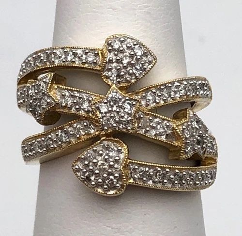 14K GOLD CROSSING HEART AND STAR RING WITH 0.40CTS NATURAL DIAMONDS 8.7 GRAMS: 14K GOLD CROSSING HEART AND STAR RING SET WITH 0.40CTS OF DIAMONDS SIZE: 6.75 14k Gold crossing Heart and Star Ring set with 0.40cts of Diamonds Condition: New with original tag, has been moved around