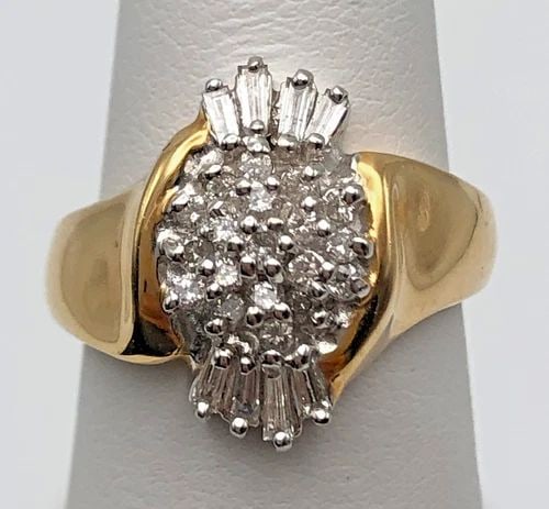 14K GOLD WOMAN'S CLUSTER STYLE RING WITH 0.53CTS OF DIAMONDS SIZE: 6.75 6.7G: 14K GOLD WOMAN'S CLUSTER STYLE RING SET WITH 0.53CTS OF DIAMONDS SIZE: 6.75 14k Gold Woman's cluster style Ring set with 0.53cts of Diamonds Condition: Used, has been cleaned Material: 14k Yellow Gold