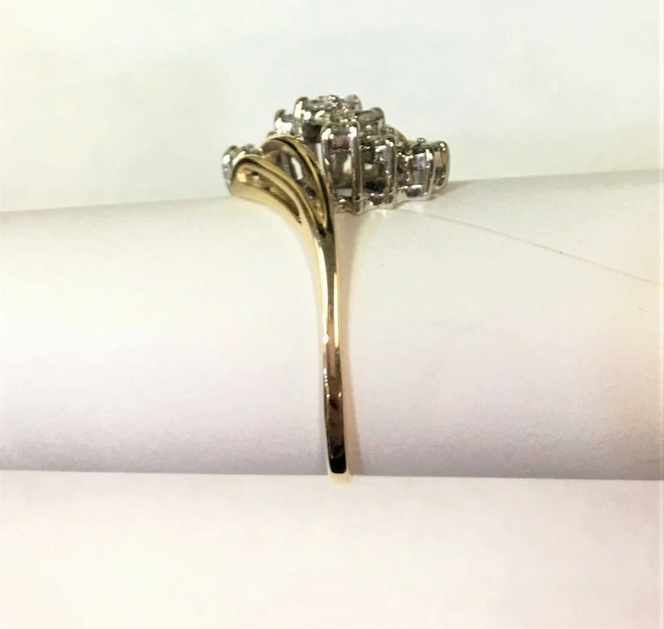 14K GOLD WOMAN'S RING WITH 0.80CTS NATURAL DIAMONDS CLUSTER (SIZE: 9.75) 4.3G: 14K YELLOW GOLD WOMAN'S RING WITH DIAMONDS CLUSTER STYLE (SIZE: 9.75) 14k Yellow Gold Woman's Ring with Diamonds You are bidding on a 14k Yellow Gold Woman's Ring with Diamonds. The Ring has some mark