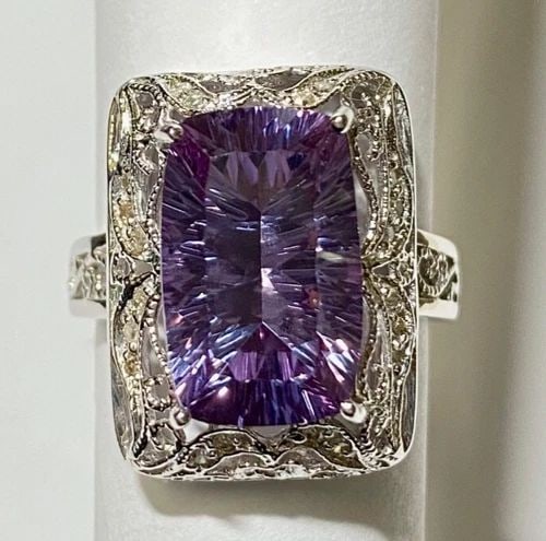 NEW 14K WHITE GOLD RING WITH PURPLE LAB-CREATED SAPPHIRE, DIAMONDS (SIZE 7) 7G: Women's 14k White Gold Ring with purple lab-created sapphire and 0.15CTS Diamonds (Size 7) You are bidding on a new with imperfections Women's 14k White Gold Ring with purple lab-created sapphire and 