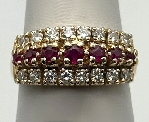 14K GOLD RING WITH 0.46CTS OF NATURAL RUBIES AND 0.50CTS OF DIAMONDS SIZE 6.25: 14K GOLD RING WITH 0.46CTS OF NATURAL RUBIES AND 0.50CTS OF DIAMONDS SIZE 6.25 14k Gold Ring with 0.46cts of Rubies and 0.50cts of Diamonds Condition: Used, has been fully cleaned Material: 14k Yellow