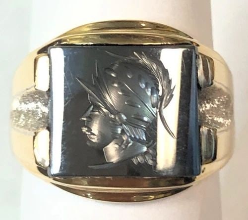 10K YELLOW GOLD RING WITH CENTER HEMATITE INTAGLIO SIZE: 9.25 8.8G: 10k Yellow Gold Ring with center Hematite Intaglio You are bidding on a 10k Yellow Gold Ring with Hematite Intaglio. The piece has been fully checked and inspected by our in house Jewelers. The ring d