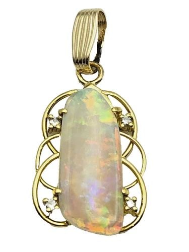 14K GOLD PENDANT NATURAL OPAL, 0.06CTS OF DIAMONDS ( 3.3 GRAMS ): 14K GOLD PENDANT NATURAL OPAL, 0.06CTS OF DIAMONDS 3.3 GRAMS 14k Gold Pendant Natural Opal, 0.06cts of Diamonds Condition: Used Material: 14k Yellow Gold Pendant Size: 37mm x 17mm Total Weight: 3.3 gr