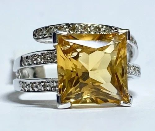 14K WHITE GOLD RING WITH CITRINE AND 0.15CTW DIAMONDS (SIZE 7) 6 GRAMS: WOMEN'S 14K WHITE GOLD RING WITH CITRINE AND 0.15CTS DIAMONDS (SIZE 7) Women's 14k White Gold Ring with Citrine and 0.15CTS Diamonds (Size 7) You are bidding on a new with tags Women's 14k White Gold 