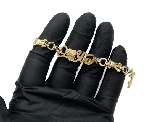 10K GOLD "I LOVE YOU" BRACELET WITH TEDDY BEAR LINKS ( 7.5 INCH ) 7.5 GRAMS: 10K GOLD "I LOVE YOU" BRACELET WITH TEDDY BEAR LINKS 7.5" 7.5 GRAMS 10k Gold "I love you" bracelet with teddy bear links Condition: New, no box or papers. Material: 10k Yellow Gold, with White Gold ac