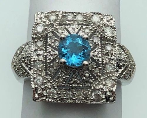 14K WHITE GOLD SQUARE RING WITH BLUE TOPAZ AND DIAMONDS (SIZE 6.5) 5.3 GRAMS: 14K WHITE GOLD SQUARE HEAD RING WITH CENTER BLUE TOPAZ AND 0.35CTS OF DIAMONDS 14k White Gold Square Head Ring with center Blue Topaz and 0.35cts of Diamonds You are bidding on a 14k White Gold Square