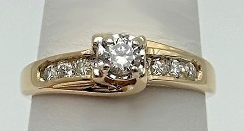 14K YELLOW GOLD ENGAGEMENT RING WITH 0.50CTW DIAMONDS (SIZE 8.5) 3.6 GRAM: 14k Yellow Gold Ring Engagement Style with 0.50ctw of Diamonds Condition: Used Material: 14k Yellow Gold Ring Size: 8.5 Weight: 3.6 grams Top Width: 4.8mm Bottom Width: 1.3mm Stone Info: All Diamonds 