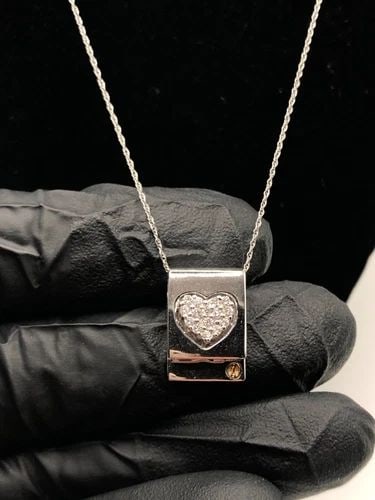 14K WHITE GOLD CHAIN AND SQUARE HEART PENDANT WITH 0.22CTS DIAMONDS ( 5 GRAMS ): 14K WHITE GOLD CHAIN AND SQUARE HEART PENDANT WITH 0.22CTS DIAMONDS 14k White Gold Chain and square Heart Pendant with 0.22cts Diamonds You are bidding on a 14k White Gold Chain and square Heart Penda